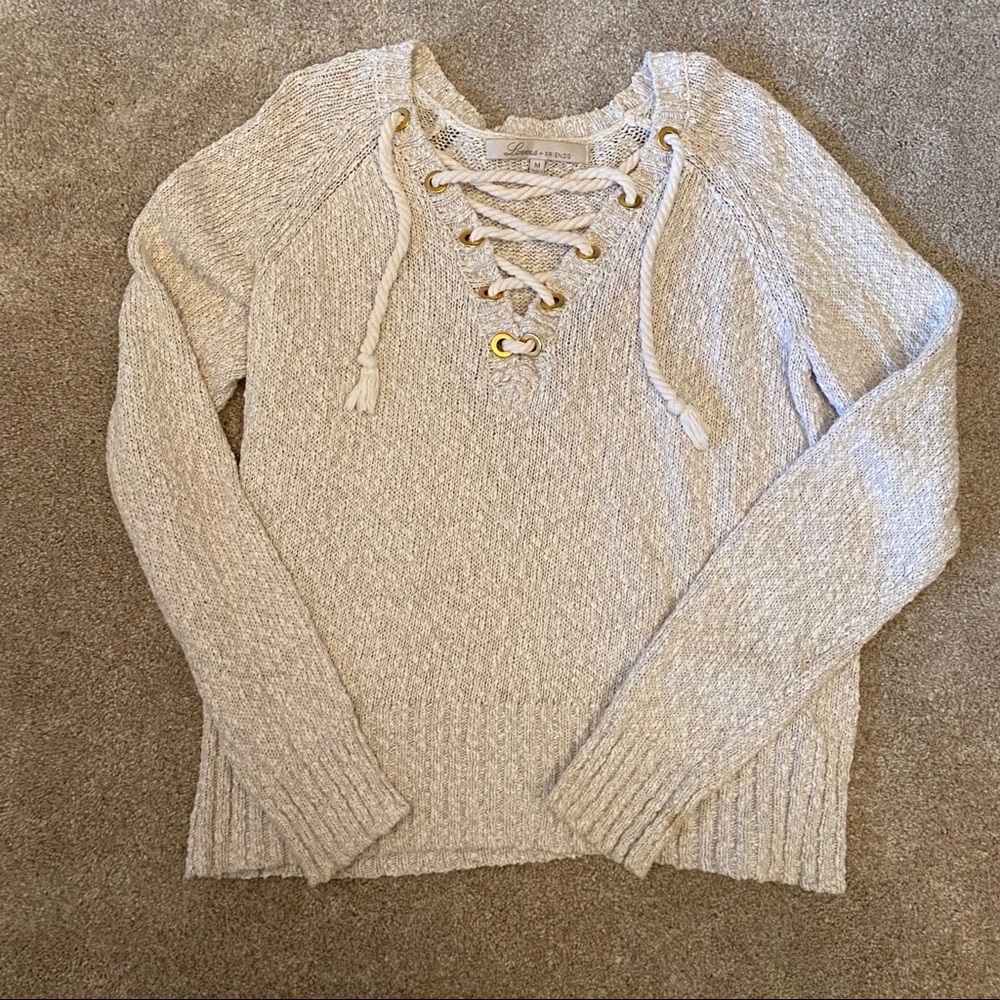 Cream criss cross long sleeve sweater